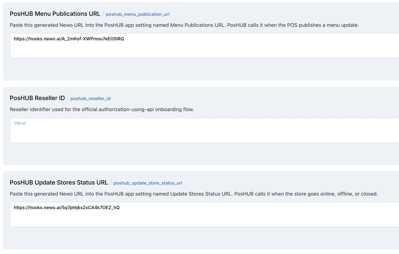PosHUB Settings group showing the two generated webhook URL values and an empty Reseller ID field.